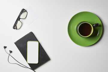 Bright office workspace. Work space with notepad, keyboard, coffee and glasses. Work space table desk. Flat lay, top view, copy space