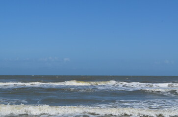 The beach and ocean waves crashing