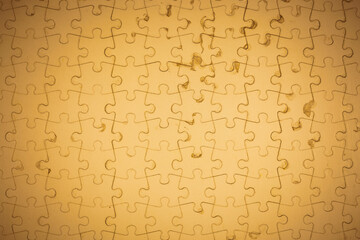 Brown Jigsaw puzzle background.