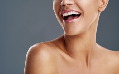 Life is beautiful when youre smiling. Cropped shot of a beautiful young woman posing in the studio.