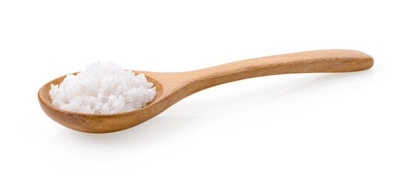 Salt in woodn spoon isolated on white