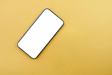 Overhead phone mockup with white screen and contrast yellow with copy space