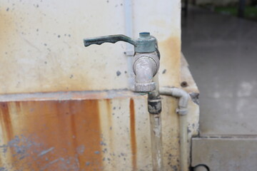 defocused old PVC Plastic Water Faucet