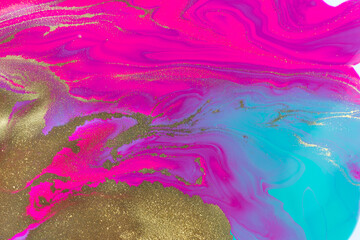 Gold yellow dust spots on flow vivid paints background. Abstract print