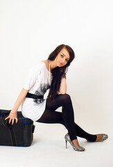 Young beautiful woman with suitcase