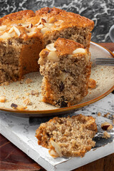 Delicious sliced nuts cake close up.