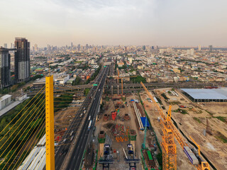 Fototapeta na wymiar Aerial view Construction of Rama 9/2 Bridge which was completed in 2024and Rama 3 Expressway - Dao Khanong - Outer Ring Road West of Bangkok, distance 18.7 km.Chao Phraya River in structure of suspens