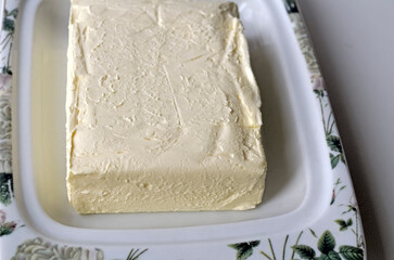 Fresh soft butter for a morning sandwich
