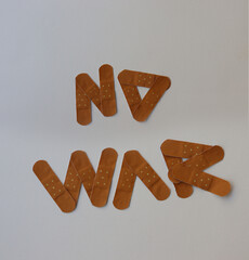 No War Concept with Adhesive bandage tape on white background