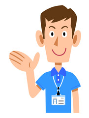 半袖のポロシャツ姿でネームタグを身に着けた男性スタッフの案内する仕草
