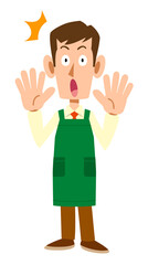 驚くスーパーマーケットの男性店員
