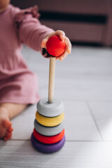 girl collects pyramid a multi-colored