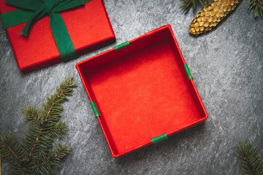 Gift box on a black background. New Year's gift top view. Red and green boxes.