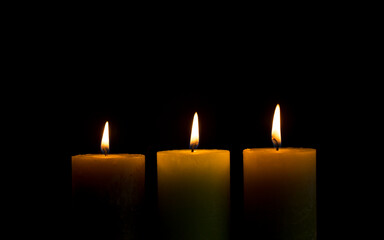 Warm candlelight on a dark mysterious background