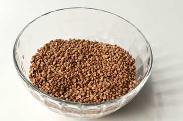 Buckwheat groats for cooking dinner in a glass container