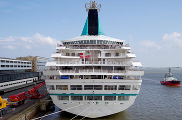 Classic cruiseship cruise ship liner Artania in Bremerhaven port with infrastructure, terminal and...