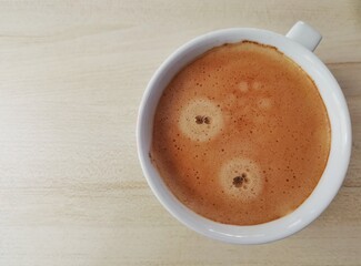 Top view Coffee cup on the wooden table.