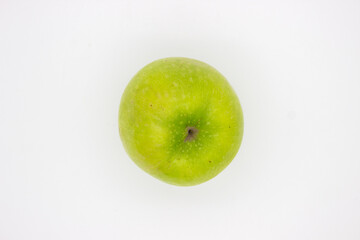 One green apple on white background