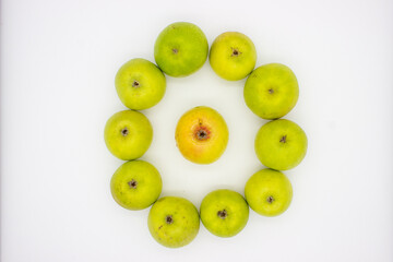 Few green apples on white background
