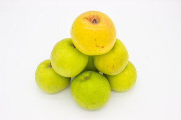 Few green apples on white background