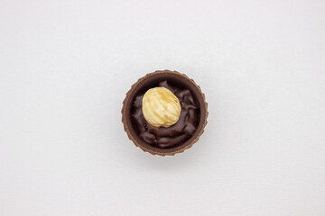 One chocolate candy with filling