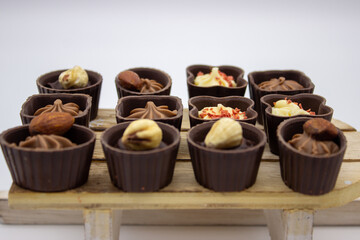 Few chocolates candy stand on sledge