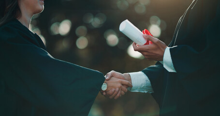 It took a lot of work and struggles to earn this diploma. Shot of a student receiving her diploma on graduation day.