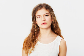 Young and beautiful. Isolated portrait of a pretty caucasian girl.