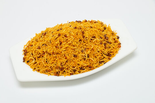 Diet Dal Bijli or Dal moth in a white ceramic bowl made with roasted Masoor Dal