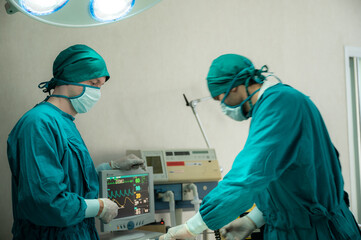 professional surgeon doctor teamwork person working in hospital operation room with surgery medical health equipment with surgical patient and nurse, emergency medicine treatment clinic concept