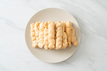 almonds meringue stick on plate