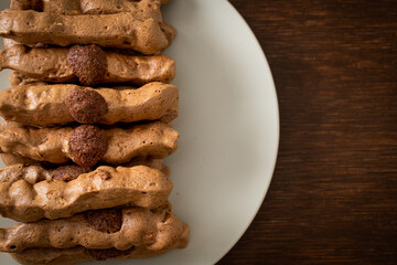 chocolate meringue stick on plate