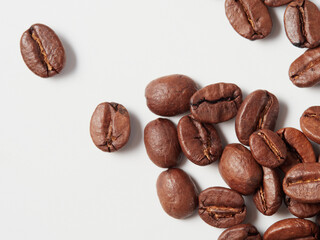 Coffee beans isolated on white background with copyspace for text. Coffee background or texture concept.