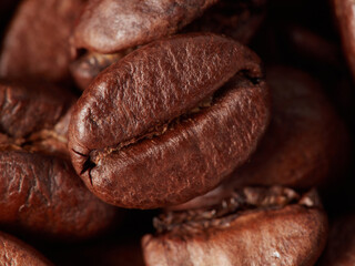 Coffee beans. On a black background. Top view. Space for copying.
