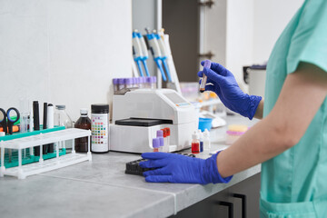 Doctor working with medical stuff in the laboratory