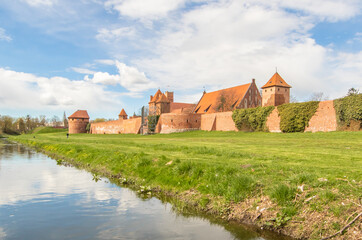 Naklejka na ściany i meble Malbork, Poland - largest castle in the world by land area, and a Unesco World Heritage Site, the Malbork Castle is a wonderful exemple of Teutonic fortress
