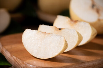 Clipping path of Chinese pear  on wooden table.