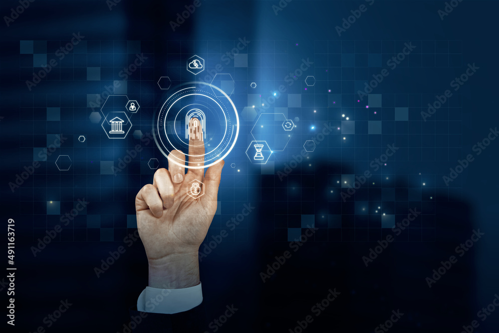 Poster Close up of businessman hand pointing at abstract glowing id fingerprint web protection and security interface on blurry blue bokeh city background. Identification, cybersecurity and privacy concept. 