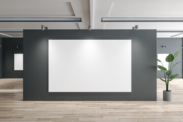 Modern gallery interior with empty white posters, mock up place and wooden flooring. Mock up, 3D Rendering.