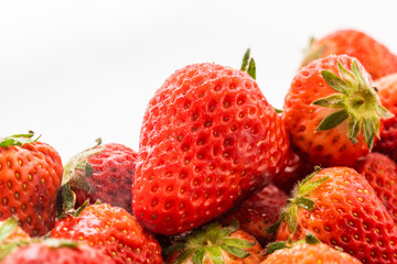 Fresh strawberries on a monochrome background