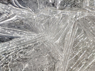 Beautiful ice needle's texture on the surface of a frozen lake.