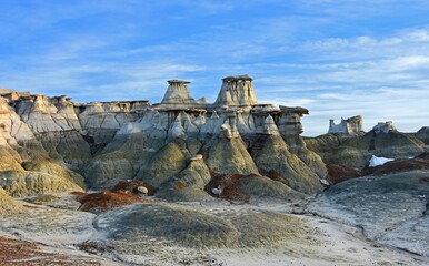 the colorful,  eroded  hoodoo rock formations in the hunter wash section of the bisti badlands on a...