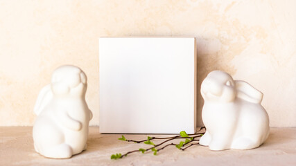 Easter background. Easter bunny rabbits decor. On kitchen table backdrop copy space. Selective focus
