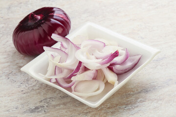 Sliced red onion in the bowl