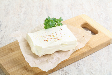 Greek Feta cheese over board