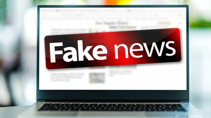 Laptop computer displaying the sign of 'Fake news'