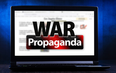 Laptop computer displaying the sign of 'WAR Propagada'