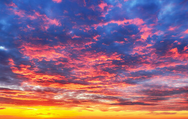 Sky at color sunset with orange red clouds
