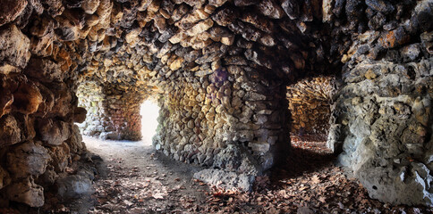 Inside the old abandoned stone furnace - obrazy, fototapety, plakaty