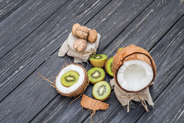 Obraz na płótnie Canvas Coconut with milk,walnut and kiwi